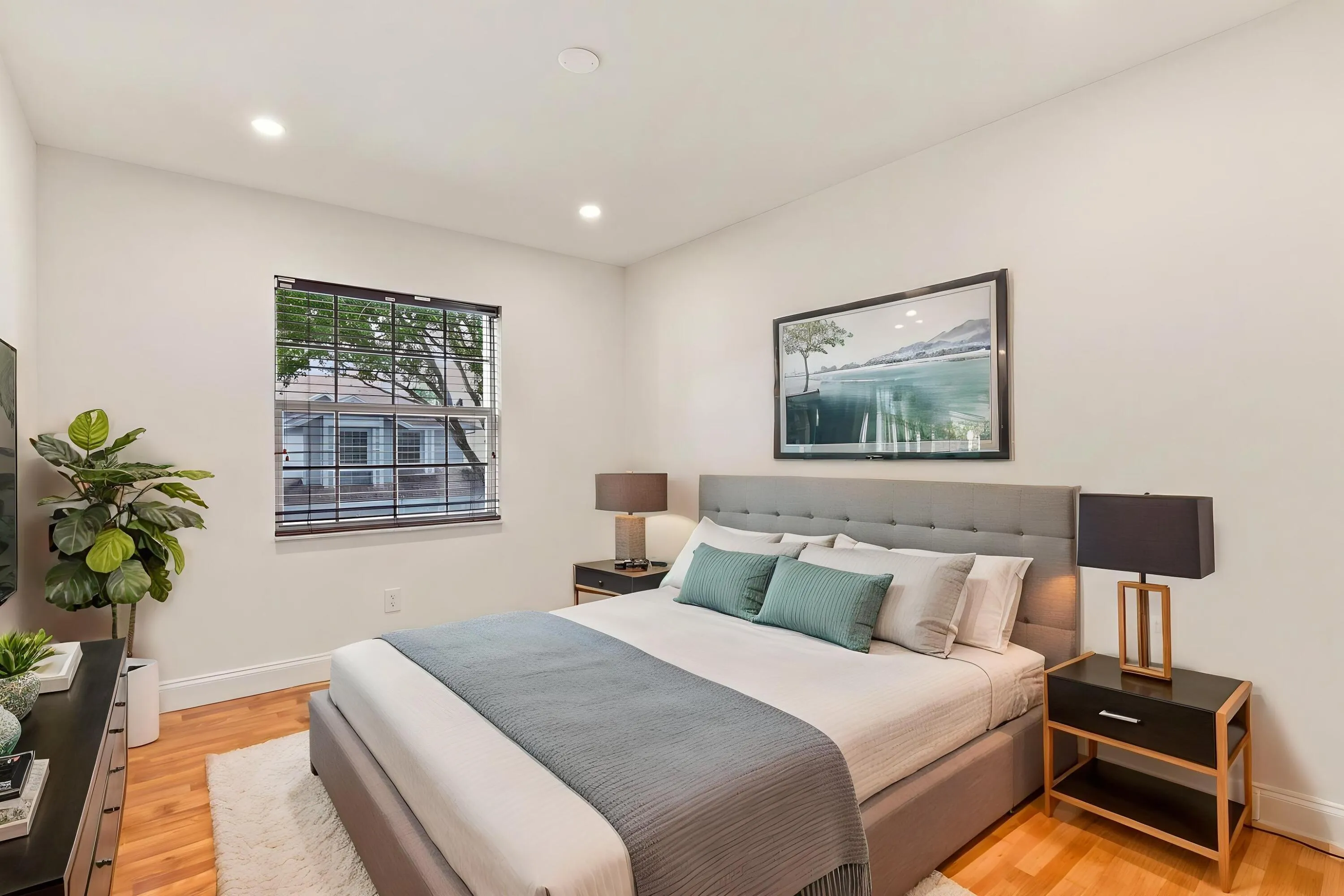 Both upstairs guest bedrooms are generously sized and filled with natural light, offering ample closet space and comfortable accommodations for family, overnight guests, or a growing household.