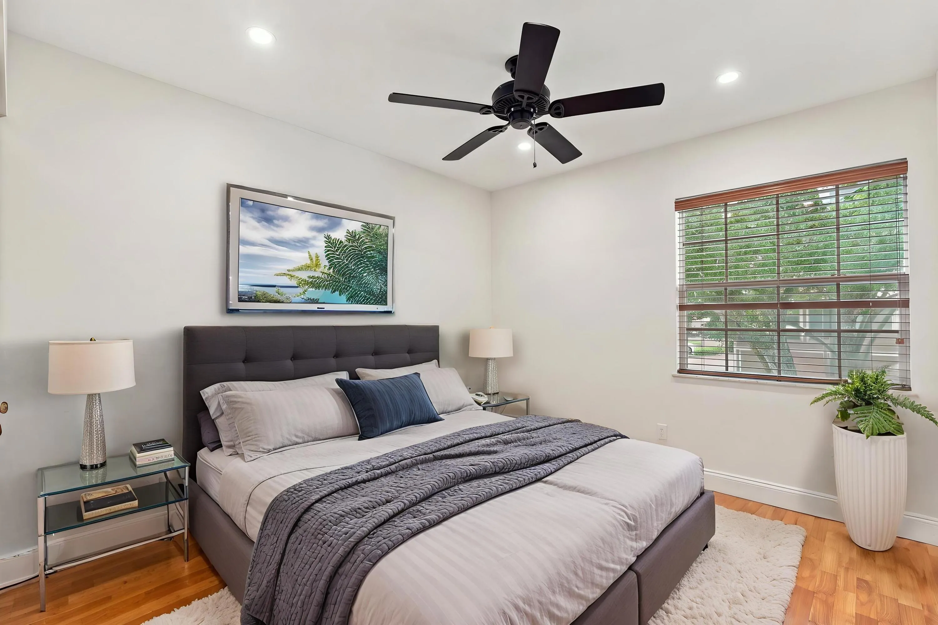 Both upstairs guest bedrooms are generously sized and filled with natural light, offering ample closet space and comfortable accommodations for family, overnight guests, or a growing household.