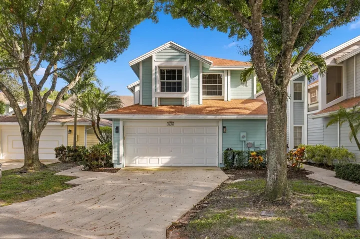 Located in a gated community in the heart of Boca Raton, this beautifully updated three bedroom, two and a half bathroom home with a loft is truly move-in ready.