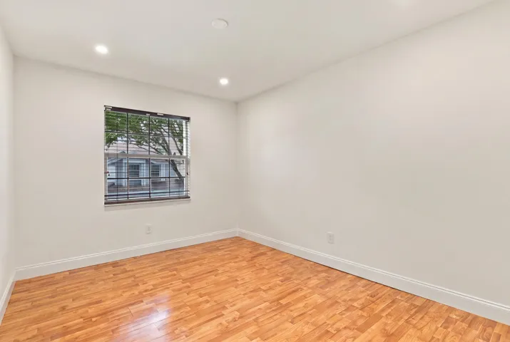 Both upstairs guest bedrooms are generously sized and filled with natural light, offering ample closet space and comfortable accommodations for family, overnight guests, or a growing household.