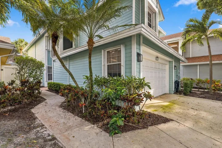 Before you step inside, you are welcomed by the charm of Fairfield, a gated community in Central Boca Raton featuring mature oak trees and an impressive selection of amenities.