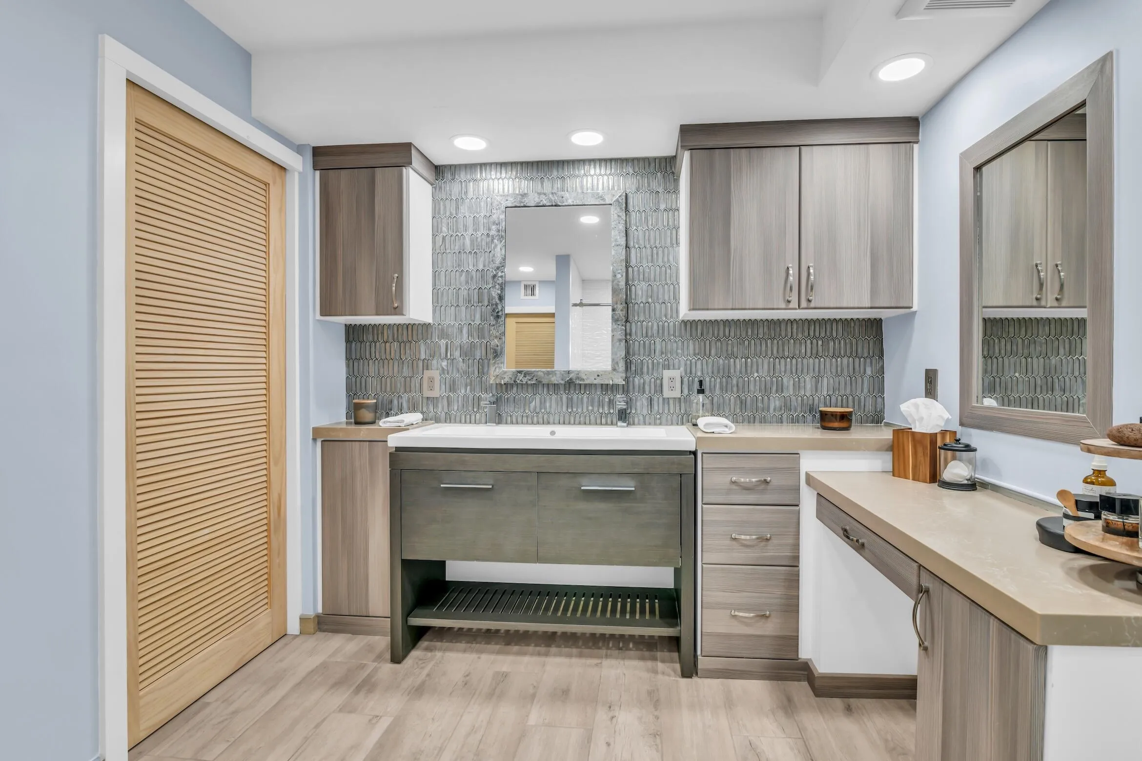 Behind the pocket door is a Washer/dryer combo. There is an additional common laundry room with two sets of large capacity washer/dryer and a sink on each floor
