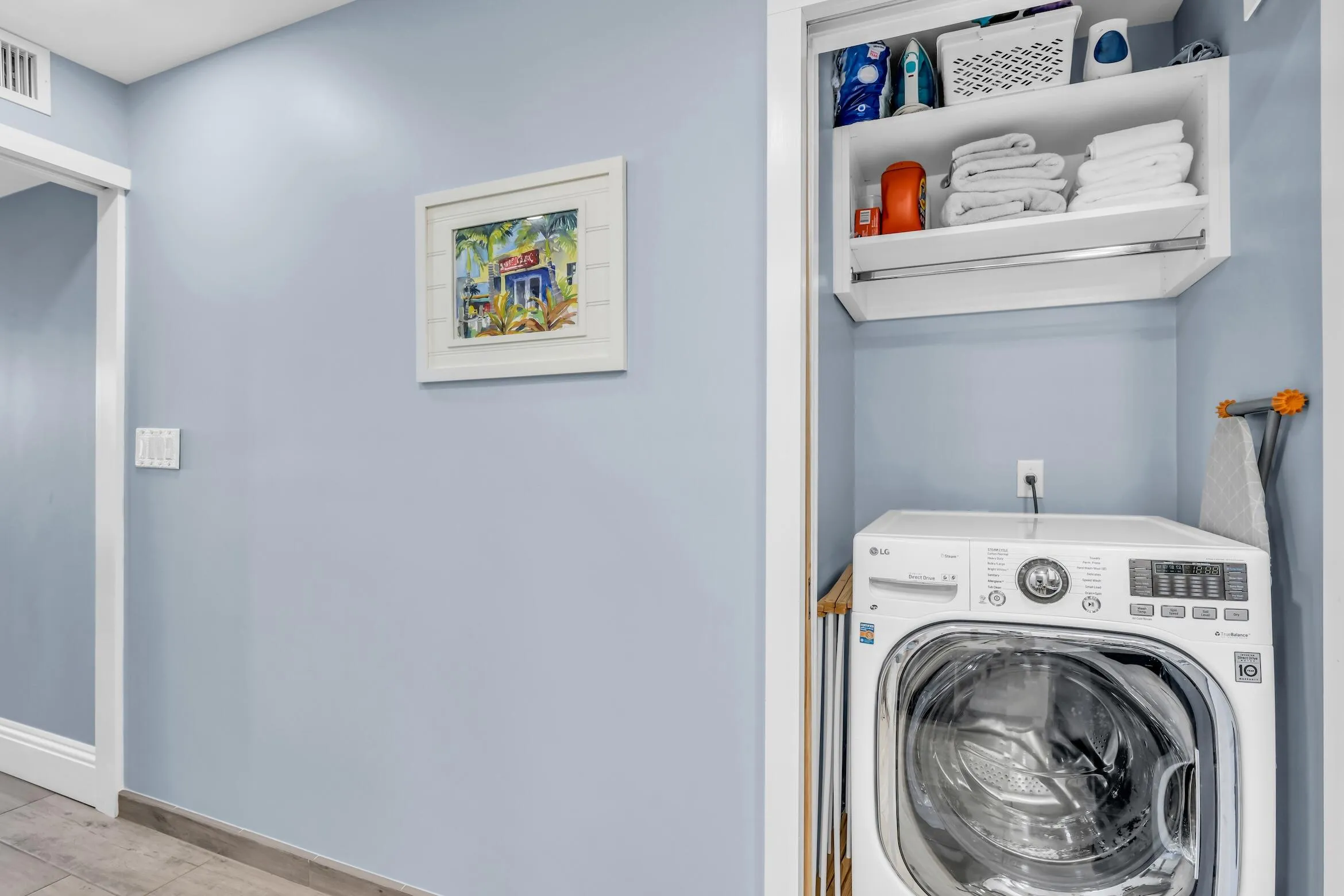 Washer/Dryer Combo and storage with a pocket door