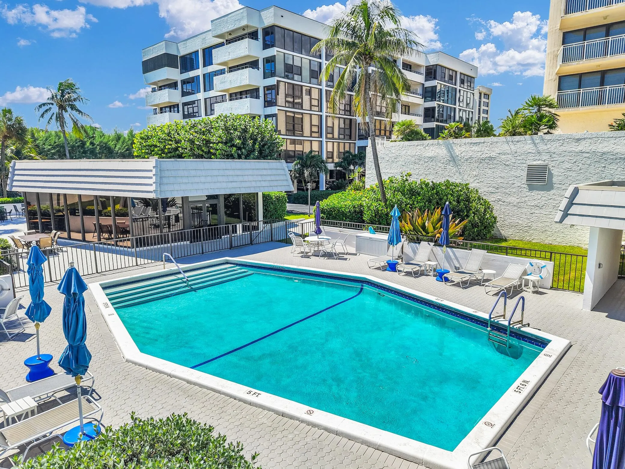 Heated pool is adjacent to the recreation room and fitness center