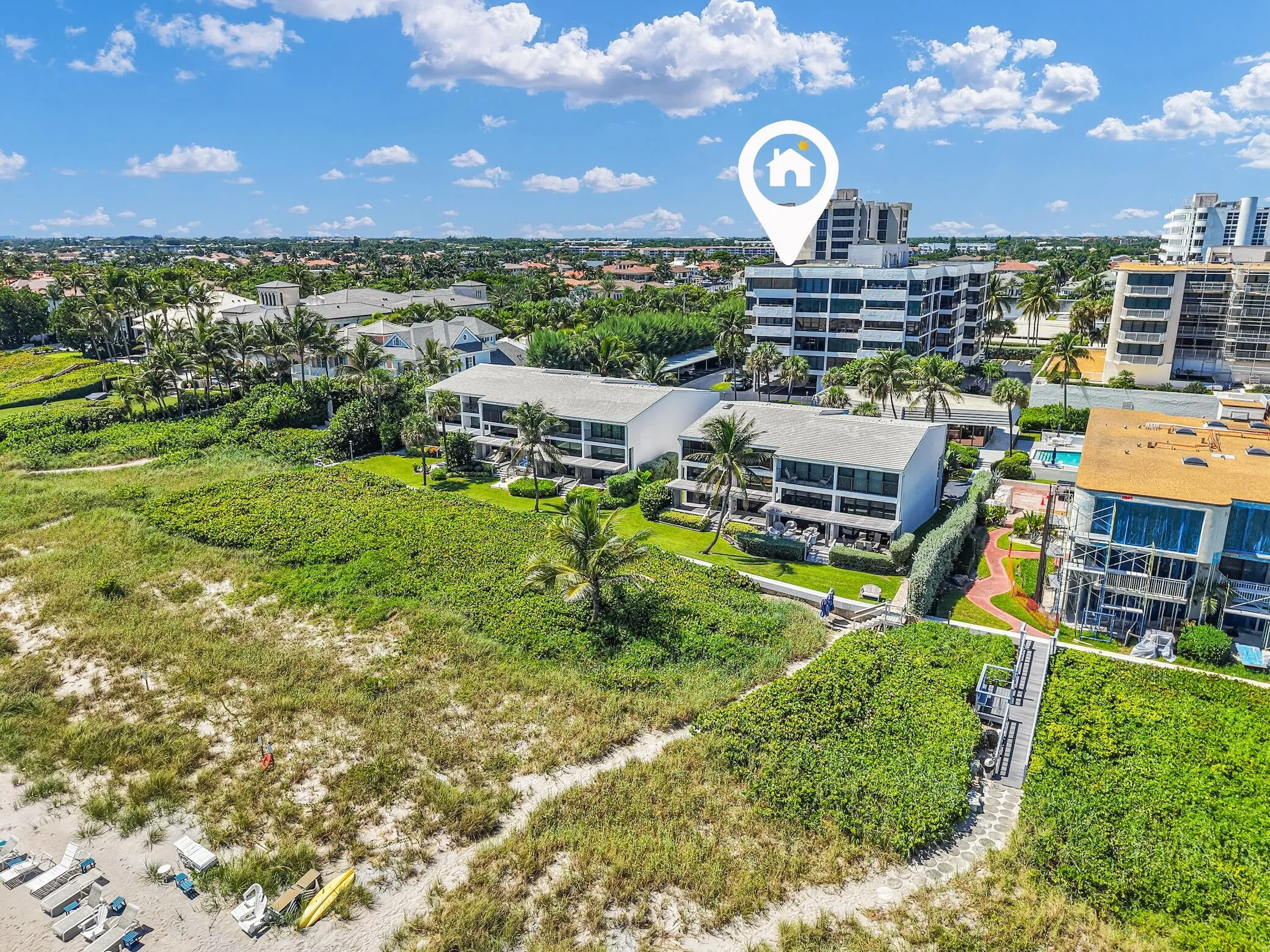 30 condo units in the main building and 8 townhomes make up the boutique beachfront complex