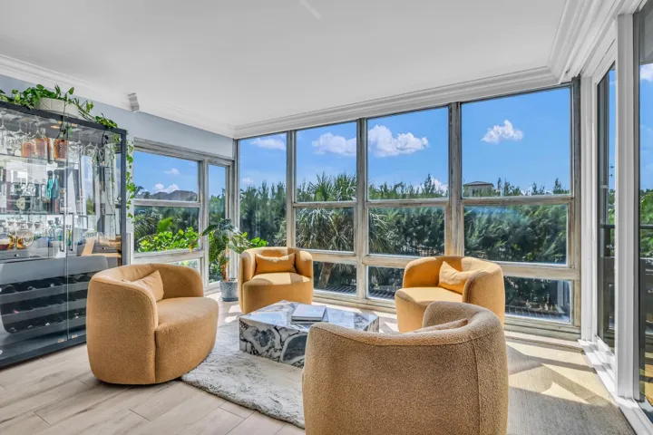 Lounge area for relaxation and enjoying beautiful views or the tropical landscaping with a partial ocean view can also be used as a spacious dinning area
