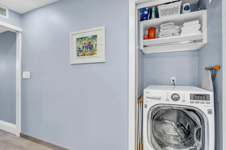 Washer/Dryer Combo and storage with a pocket door