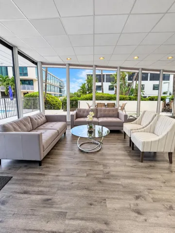 Sitting area by the pool table in the recreation room