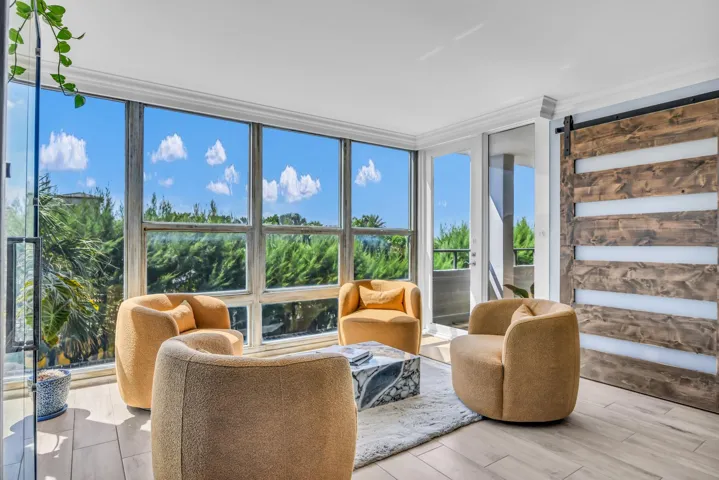 All glass windows and doors in the unit have hidden motorized shades