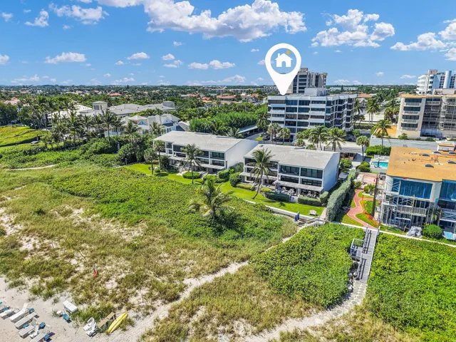 30 condo units in the main building and 8 townhomes make up the boutique beachfront complex