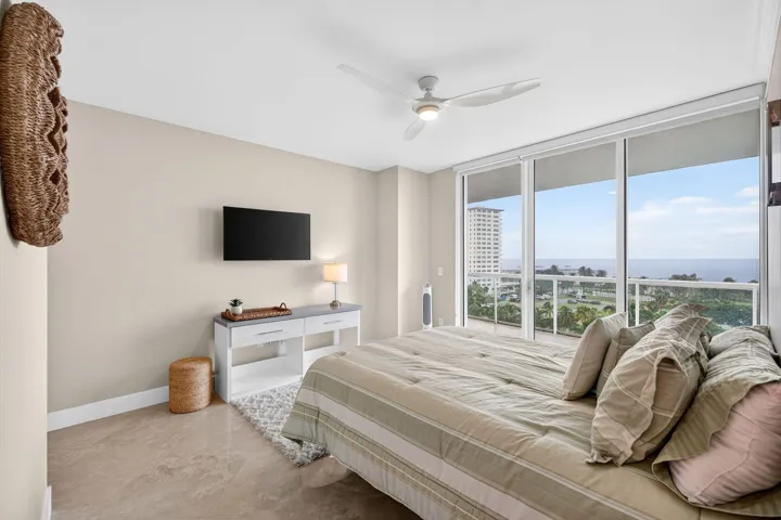 The beautifully appointed guest suite offers access to terrace and it's own en-suite bathroom with walk-in closet providing comfort, privacy and reflects th residence's understated elegance and luxurious coastal lifestyle.