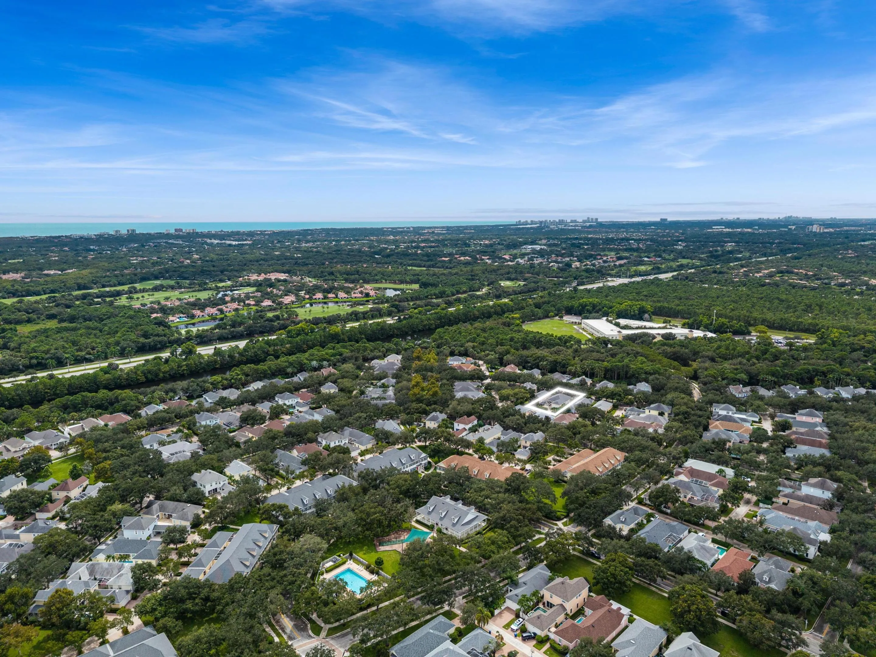 Aerial with the residence outlined and the Atlantic Ocean on the horizon