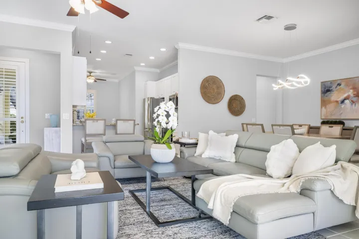 Living room, dining room and kitchen flowing together in one open layout