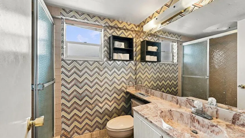 Combined Bath Shower, Full Bathroom, Tile Floor, Vanity, Wallpaper Wall, Full Bathroom, Tile Wall