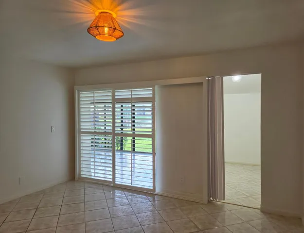 Tiled flooring and white walls