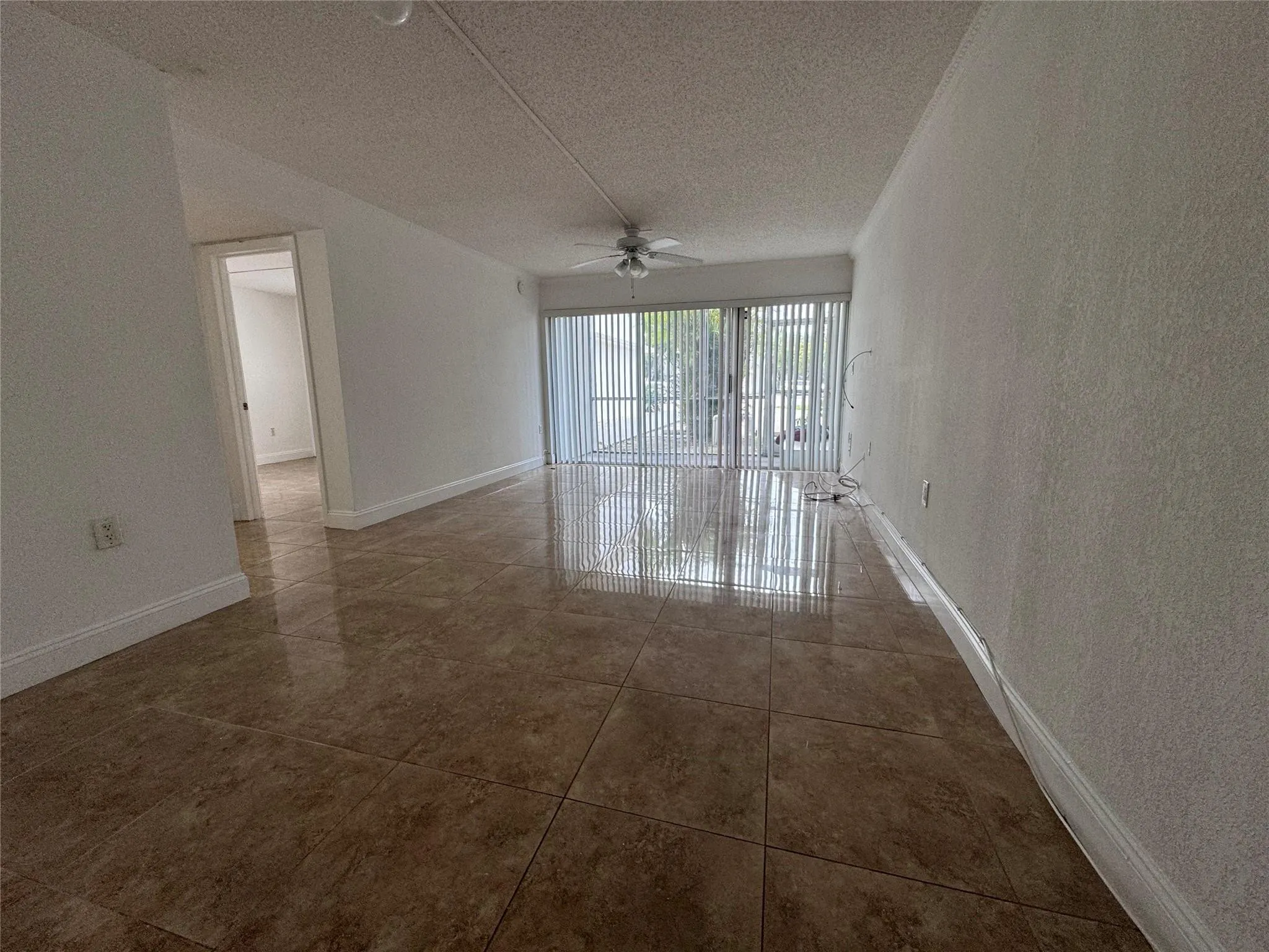 Neutral wall colors complement the tile flooring