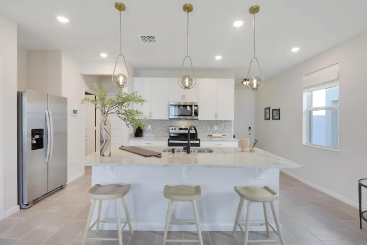 Kitchen with tile backsplash