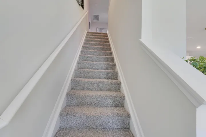 Staircase with wood banister