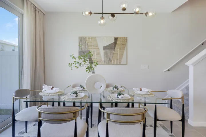 Dining area with modern fixture
