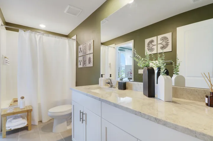 Bathroom with green accent, B