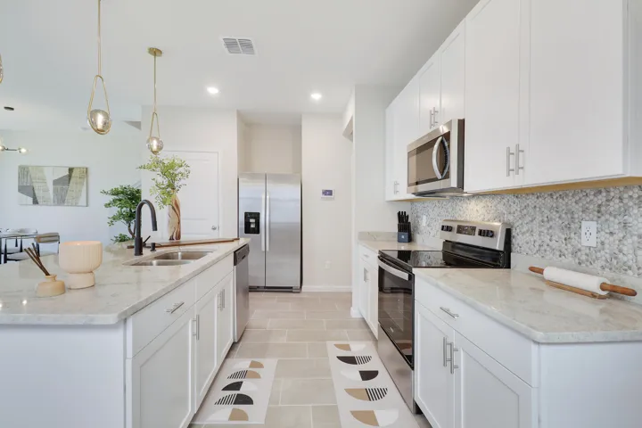 Kitchen with tile backsplash