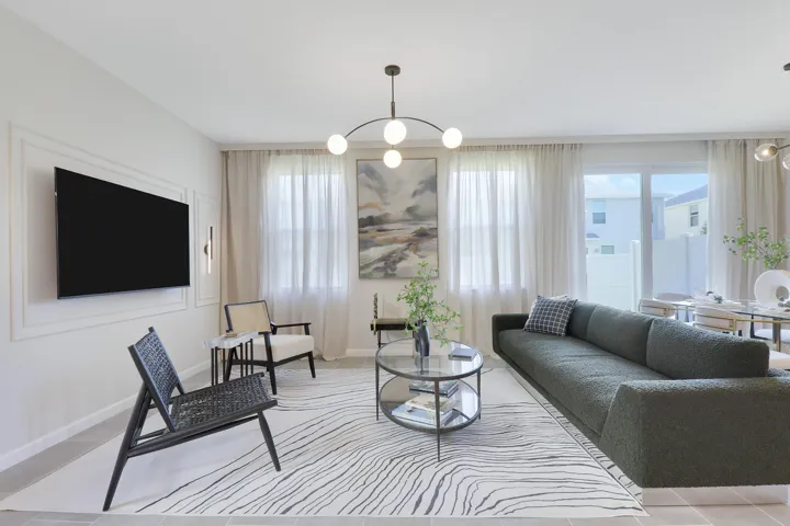 Living room with sofa and TV wall
