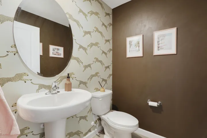 Powder room with statement wallpaper