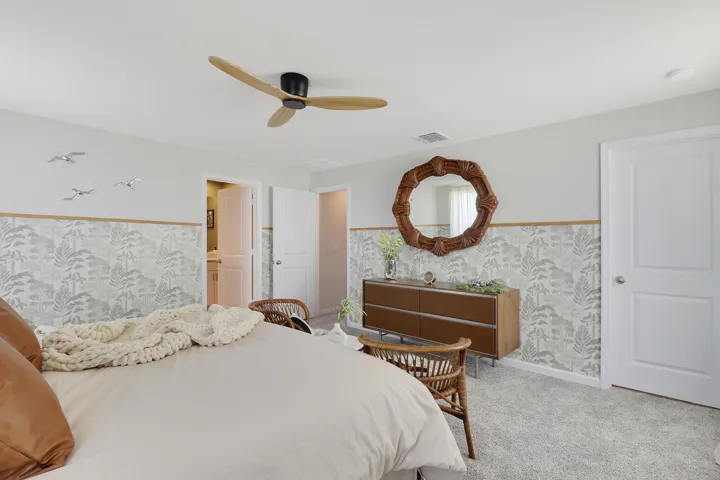 Wallpapered bedroom, second view