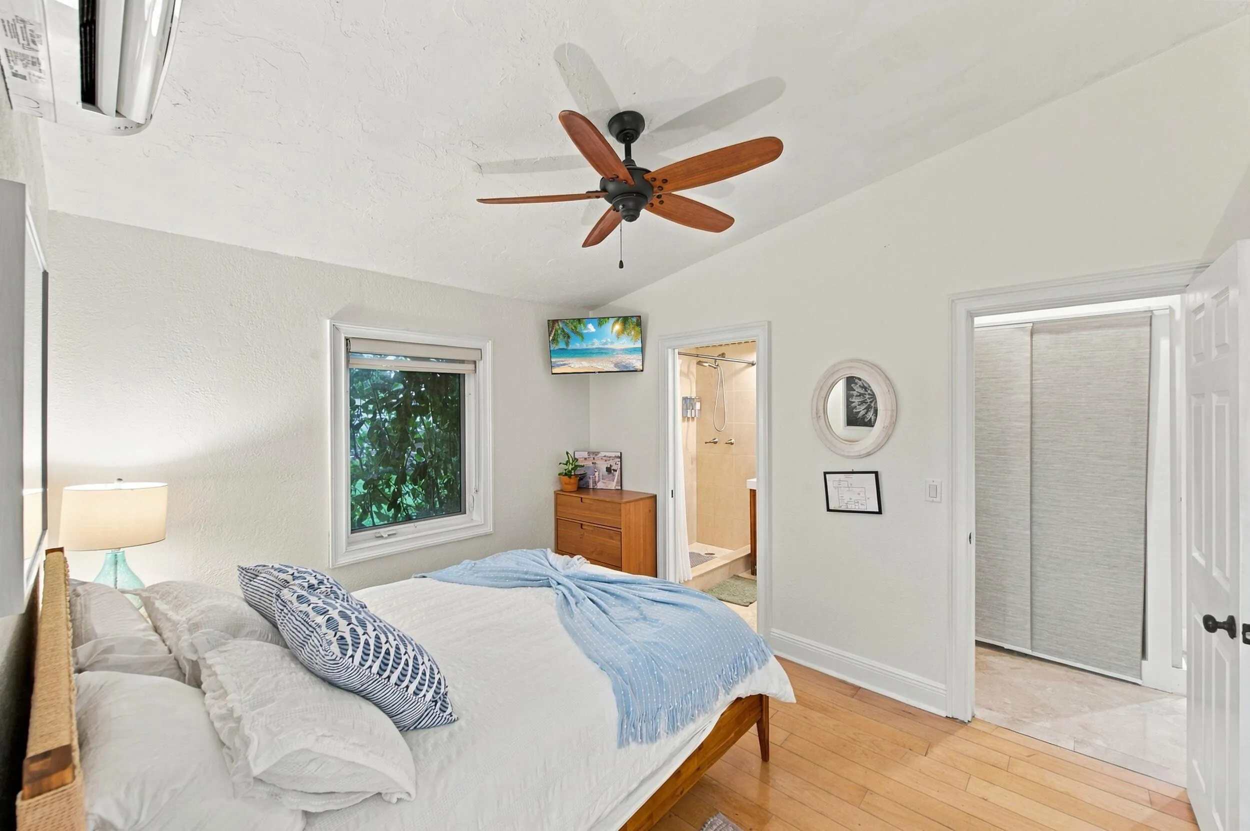 Hardwood-style flooring and vaulted ceilings