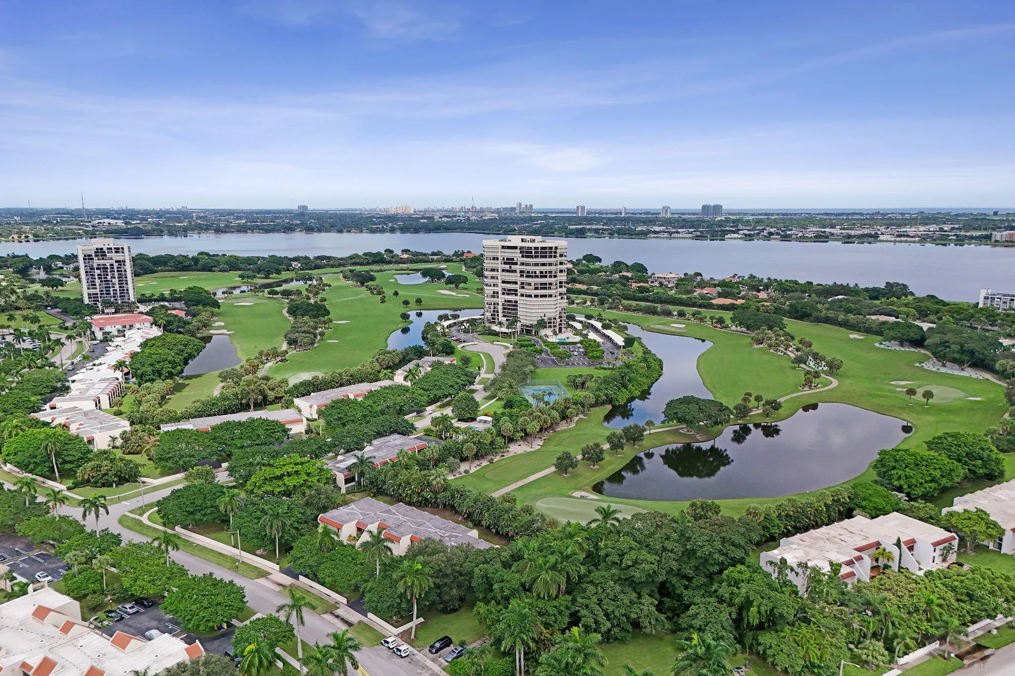 Aerial community view with golf course and waterways