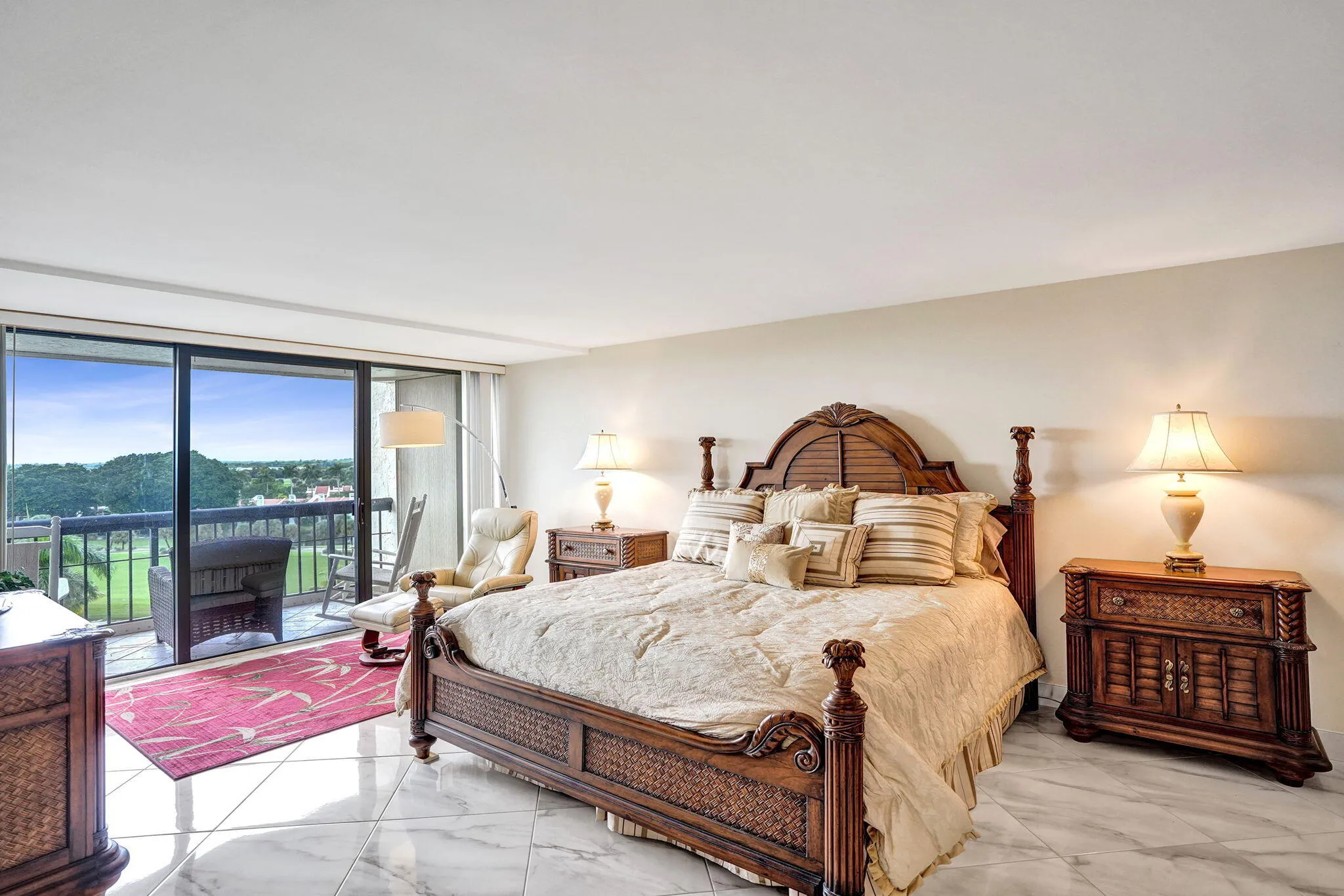 Primary bedroom with balcony access