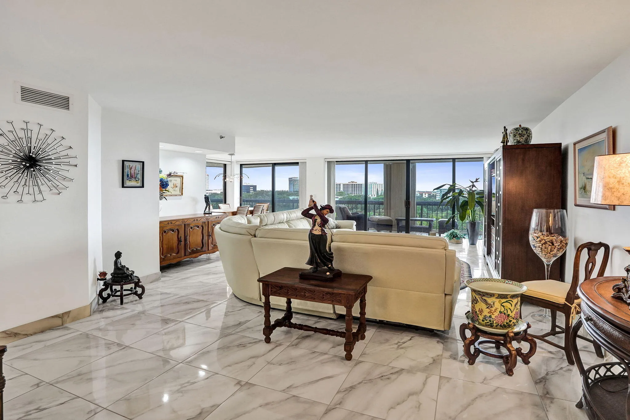 Open-concept living room with balcony views