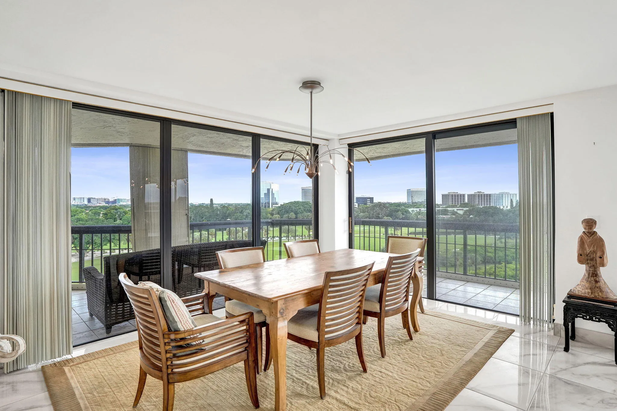 Dining area with floor-to-ceiling sliding doors