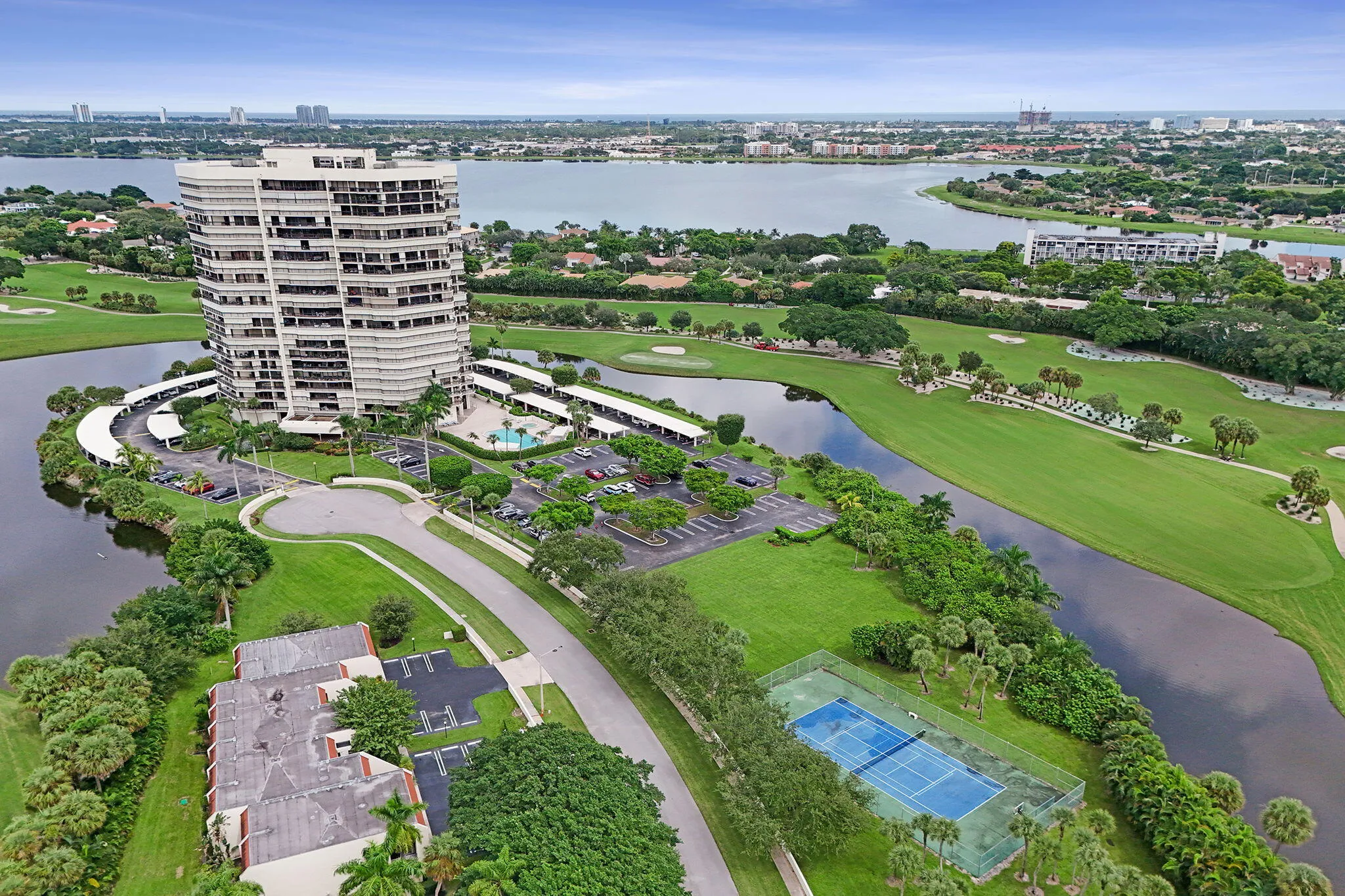 Aerial view showing the tower, pool and tennis courts