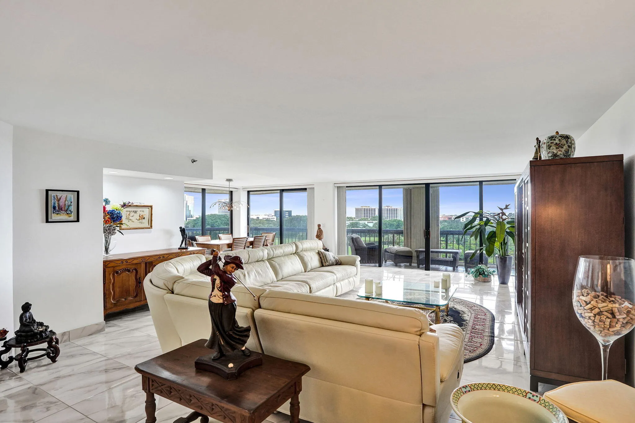 Spacious living room with floor-to-ceiling glass