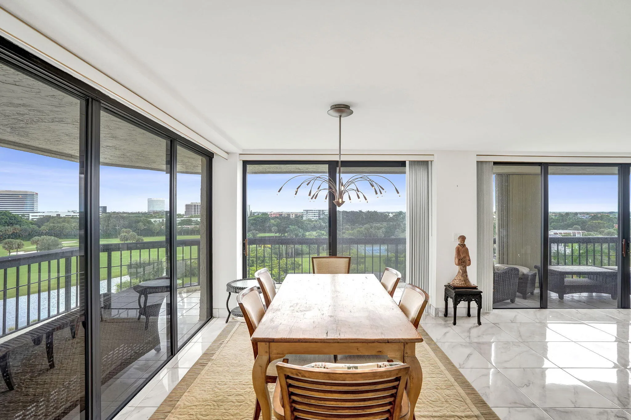 Dining area opening to the balcony