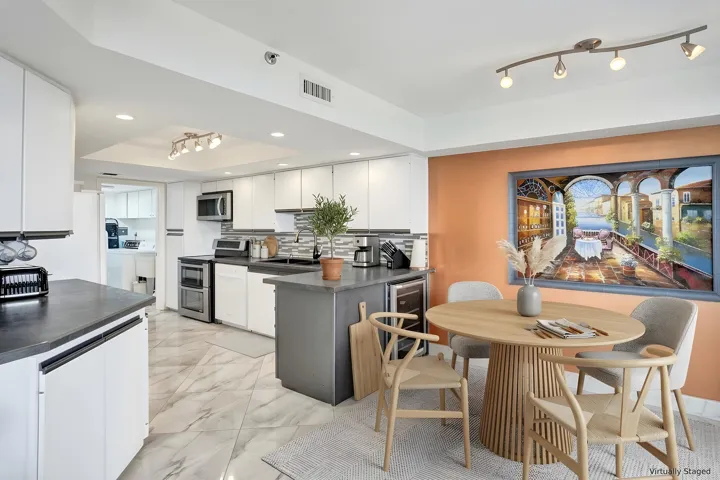 Virtually staged using AI – kitchen and breakfast area