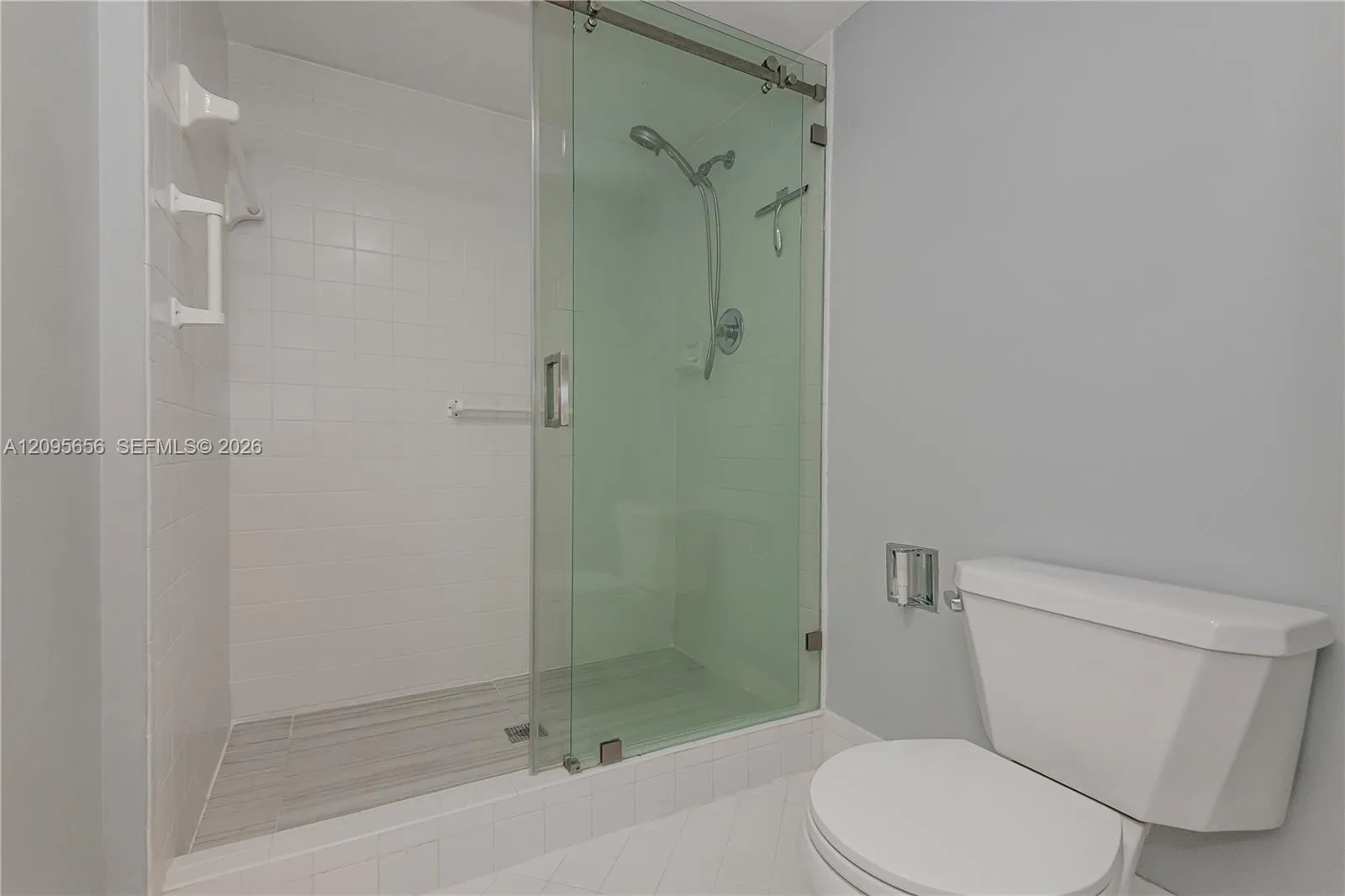 Primary Bathroom Shower with Glass Doors
