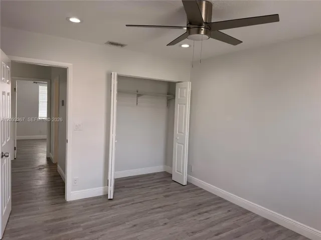 Upstairs Front Bedroom with closet.