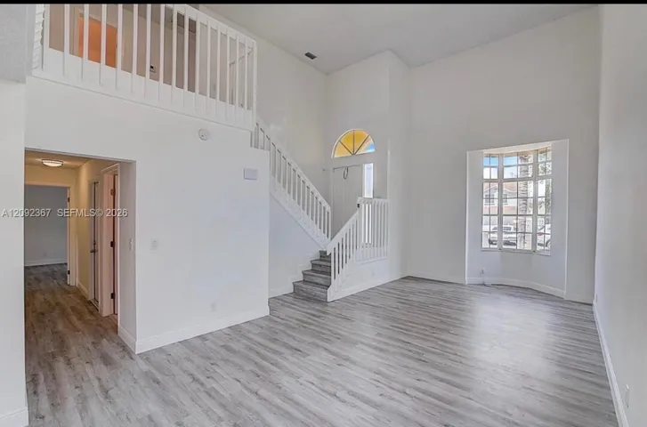 Step down to living area with Beautiful Bay Window!