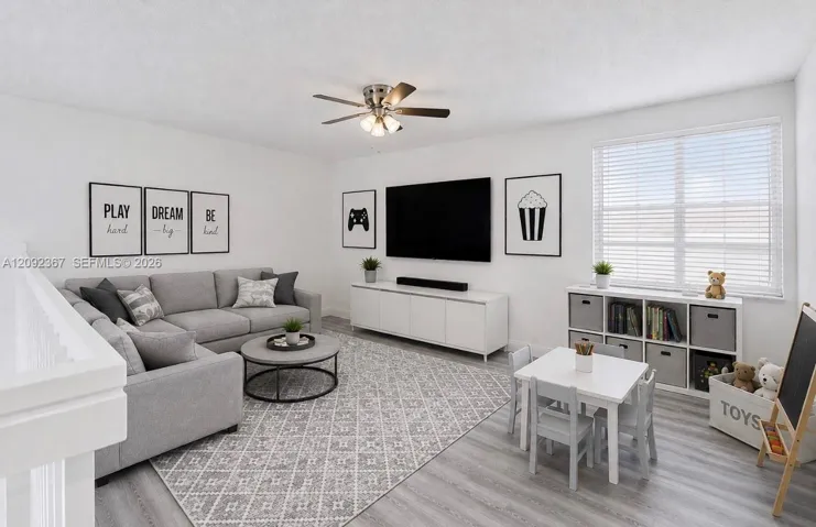 VIRTUALLY STAGED - Large Loft Upstairs staged with family room/ play room.