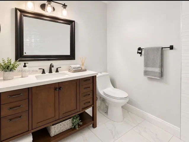 VIRTUAL STAGED - Upstairs bath with tub/shower .