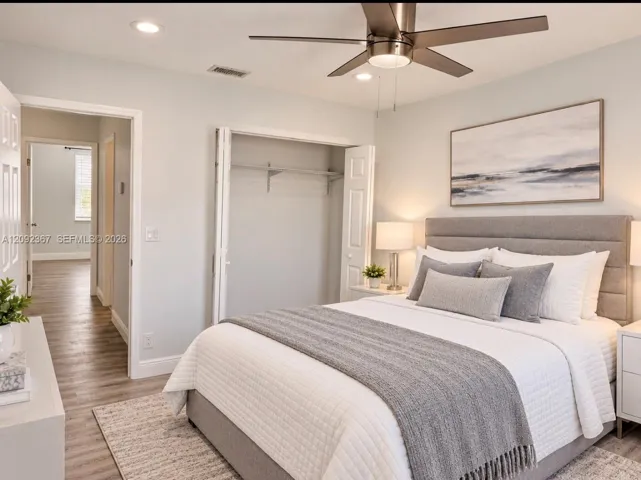VIRTUAL STAGED - Upstairs Front Bedroom with Closet.