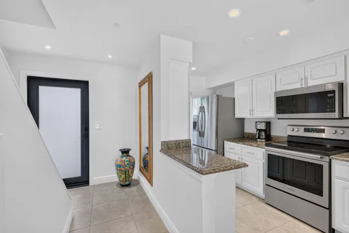 Entryway and Kitchen