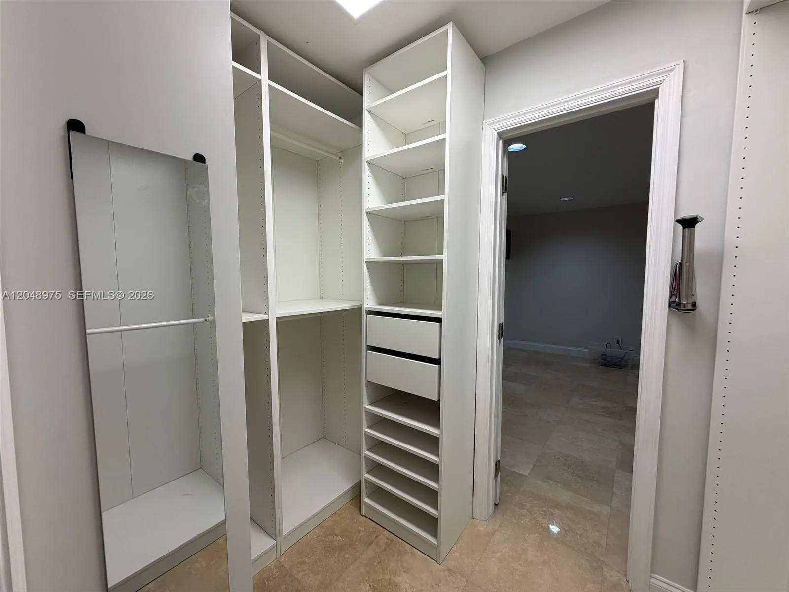 Primary Bedroom Walk-In Closet (between Primary Bathroom and Office)