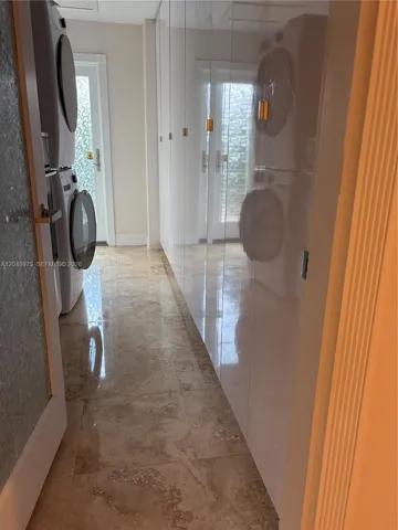 Laundry Room with FULL WALL OF STORAGE CLOSETS