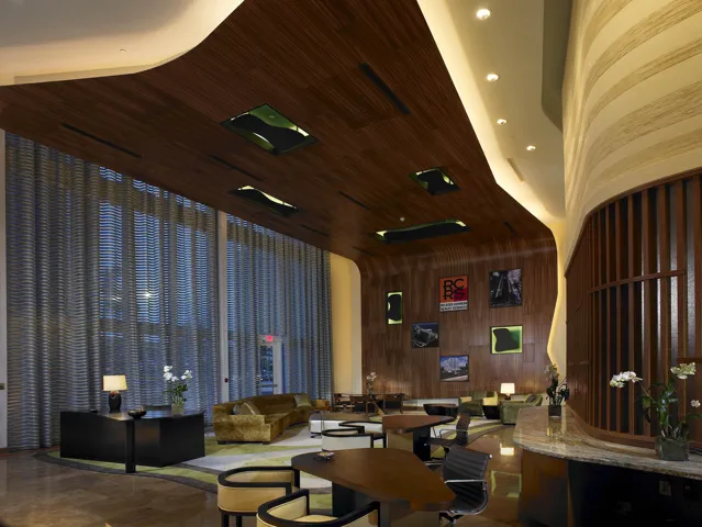 Custom wood-finish ceiling with recessed lighting
