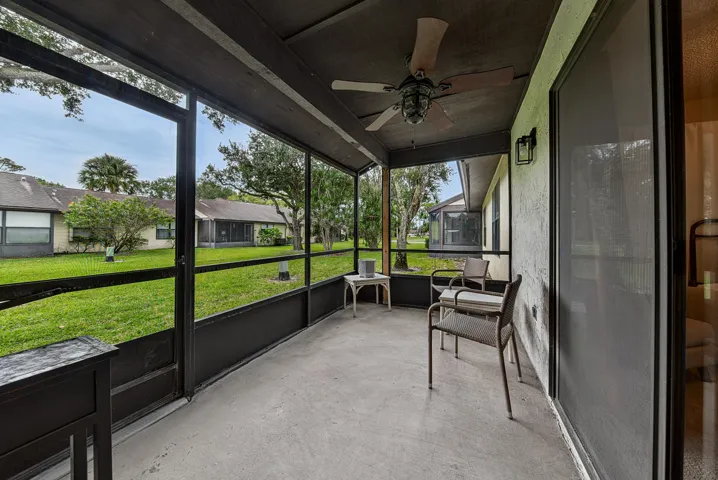 Back patio with access off living room and both bedrooms