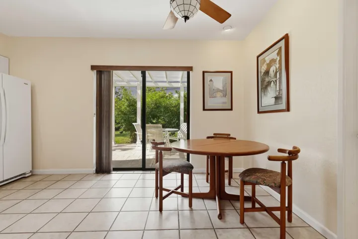 Tile flooring, recessed lighting, and a ceiling fan