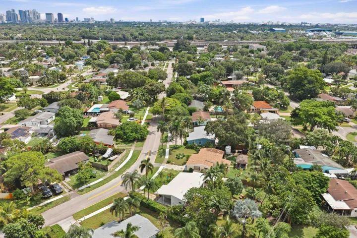 Expansive aerial perspective showcasing a residential area with mature landscaping